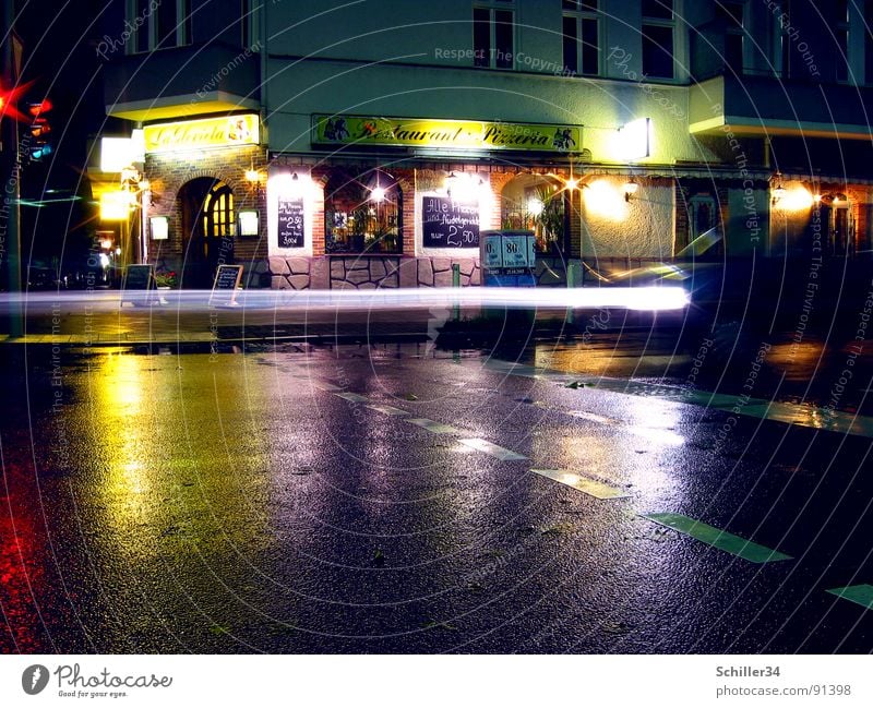 light plays Asphalt Reflection Light House (Residential Structure) Restaurant Gastronomy Long exposure Night shot Progress Facade Traffic infrastructure Street