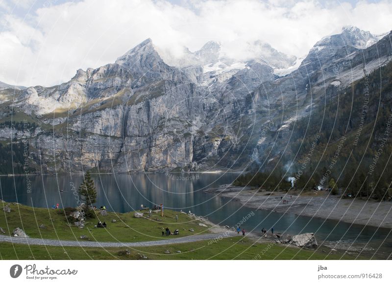 Lake Oeschinen Relaxation Tourism Trip Summer Summer vacation Mountain Hiking Landscape Autumn Rock Alps Bernese Oberland kandersteg Destination Forest