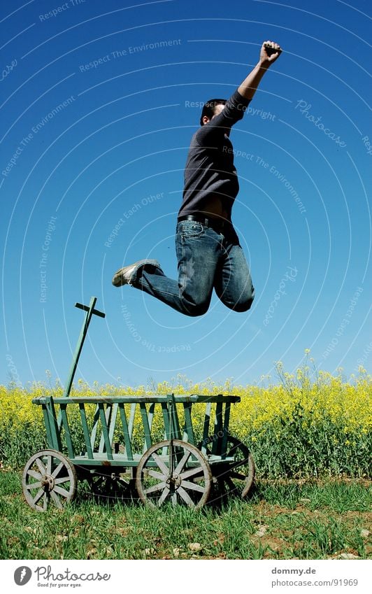 VIVA! Man Fellow Jump Carriage Trolley Derelict Meadow Degrees Celsius Canola Yellow Summer Brilliant Sweater Pants Footwear Wood Pure Leisure and hobbies