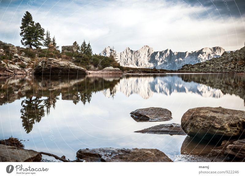 Soul balm is sitting by the mirror lake. Vacation & Travel Tourism Trip Far-off places Mountain Hiking Mountain lake Mirror Lake Landscape Sky Clouds Summer