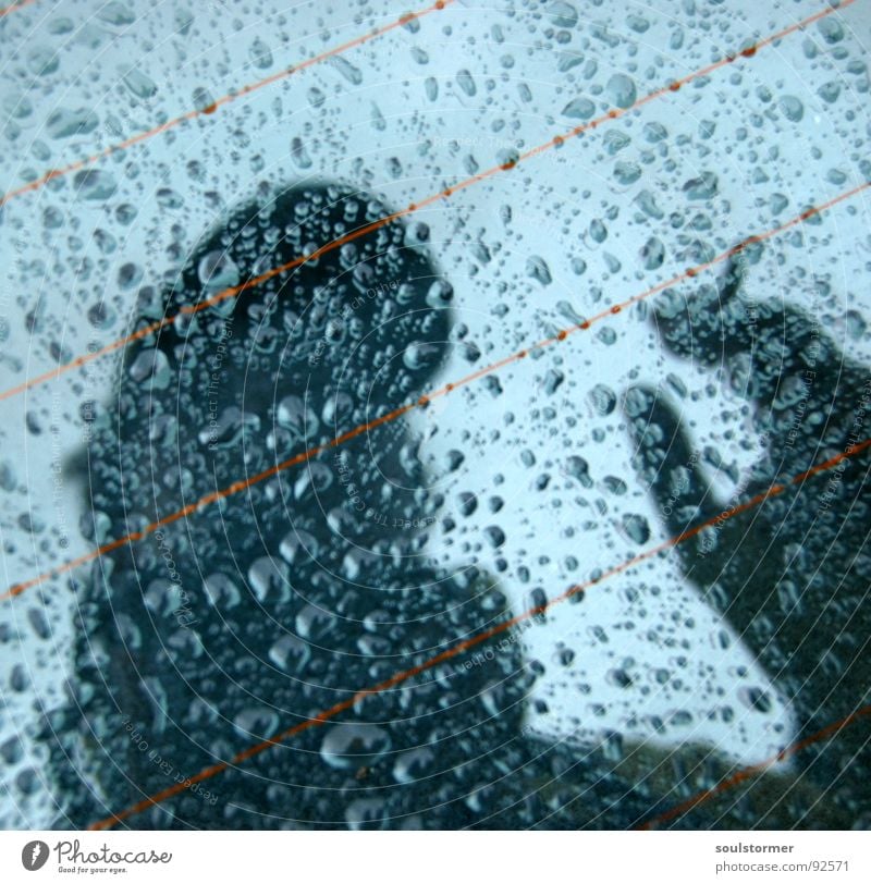 wet self-portrait Car Window Stern Trunk Rain Wet Damp Drops of water Self portrait Cap Baseball cap Cigarette Hand Upper body Reflection Mirror Water Heater