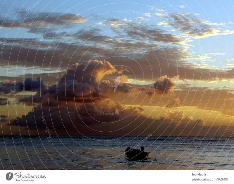 Evening at the beach Beach Sunset Sunrise Clouds Watercraft Dark Night Bright Light Lighting Horizon Ocean Lake Loneliness Fairy tale Doomed Fisherman