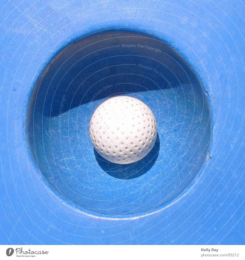 holed-in Joy Playing Mini golf Summer Summer vacation Sports Ball sports Success Golf Plastic Relaxation Simple Round Blue White Happy Concentrate Strike Lower