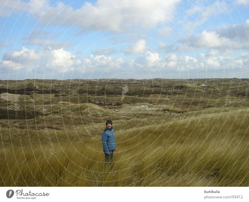 in the dunes Netherlands Coast Ocean Man Positive Cap Wool Cold Fresh Clouds Passion Speed Brown Infinity Exterior shot Beach Peace Beach dune winter jacket