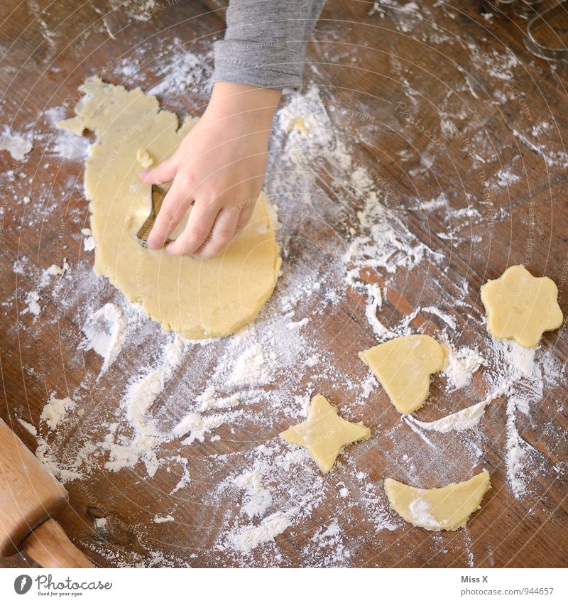 dough Food Dough Baked goods Nutrition Christmas & Advent Child Hand Wood Delicious Sweet Cookie Christmas biscuit Baking tin cookie cutter cookie dough Flour