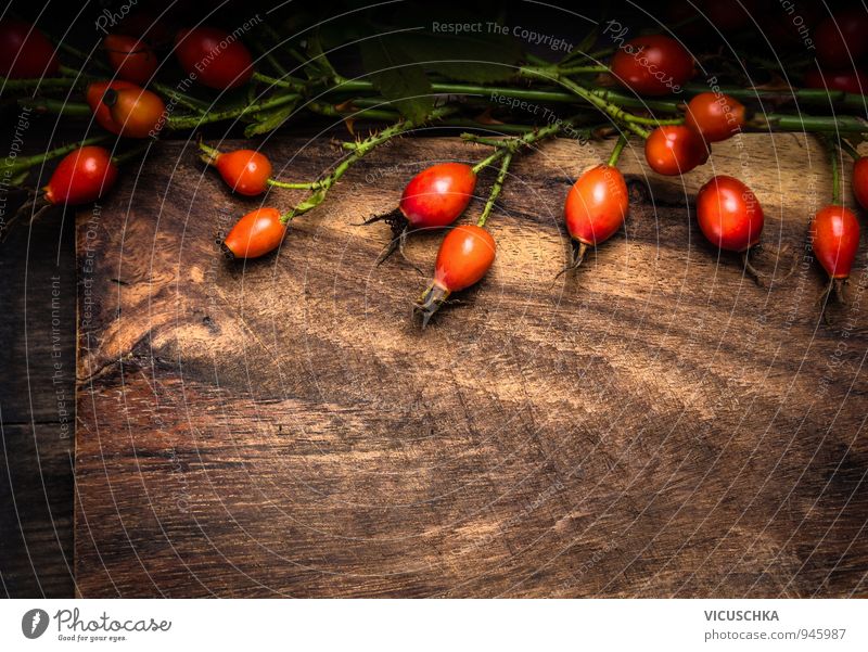 Old wooden board with rose hip Food Fruit Nutrition Organic produce Vegetarian diet Diet Design Alternative medicine Leisure and hobbies Flat (apartment) Garden