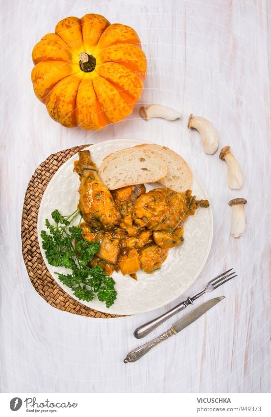 Chicken thigh with pumpkin and mushroom sauce Food Vegetable Soup Stew Herbs and spices Nutrition Lunch Banquet Organic produce Diet Crockery Plate Cutlery