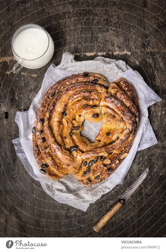 Sweet coffee wreath and cup with milk Food Dough Baked goods Cake Candy Nutrition To have a coffee Diet Beverage Milk Cup Lifestyle Style Design