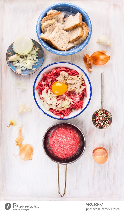 Ingredients for minced meat meatballs. Food Meat Vegetable Bread Herbs and spices Nutrition Lunch Dinner Organic produce Diet Crockery Bowl Pan Spoon Style