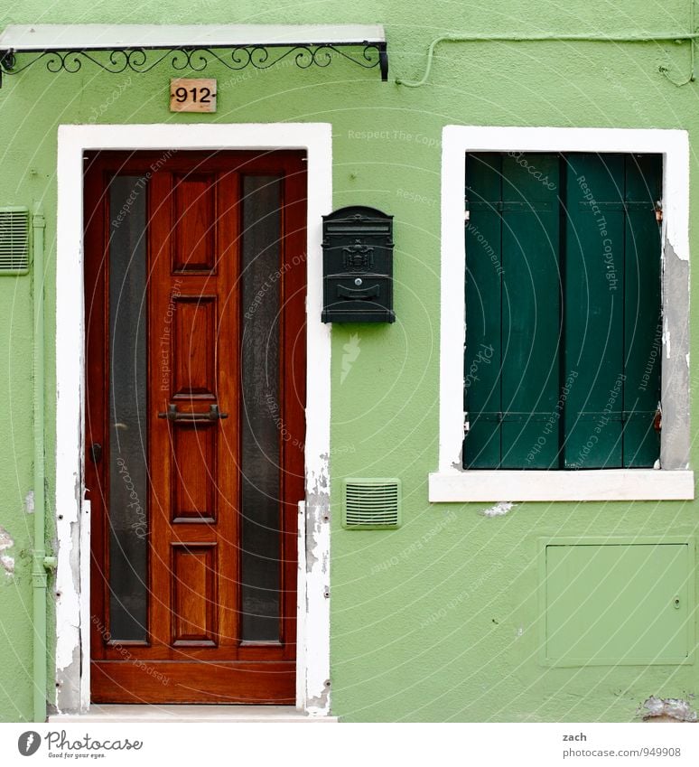 green Living or residing House (Residential Structure) Lamp Pot plant Fishing village Old town Wall (barrier) Wall (building) Facade Window Door Wood Green