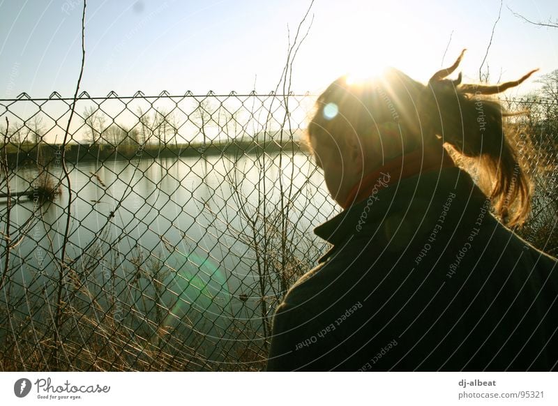 Private property! Fence Cold Lake Wet Back-light Repression Captured Grief Exterior shot Distress Youth (Young adults) Metal grid water Nature Freedom Sky Blue