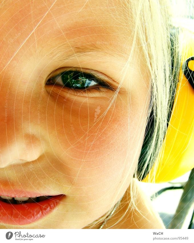 Jenny p-1 Child Girl Headphones Ear protectors Yellow Blonde Summer Listening Toddler Eyes Mouth Bright jenny Jennifer Looking Snapshot