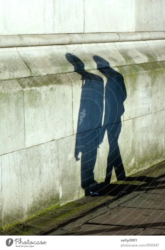 pressed against the wall... Human being Masculine 2 Wall (barrier) Wall (building) Pedestrian Sidewalk Old Touch Movement Going Together Gray Relationship Equal