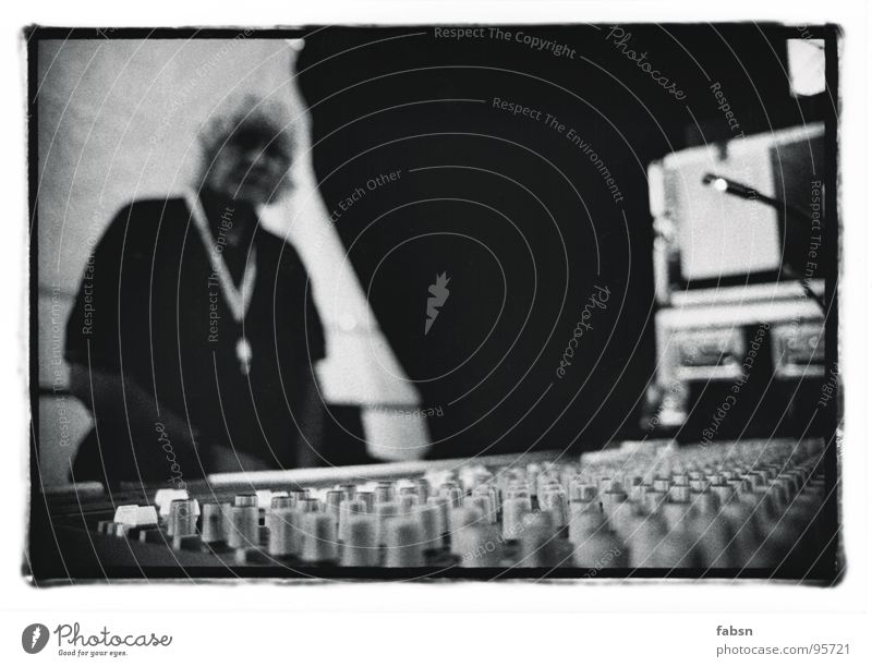 the technician Technician Mixing desk Live Lie Concert Outdoor festival Stage Buttons Electrical equipment Event Media Concentrate Black & white photo