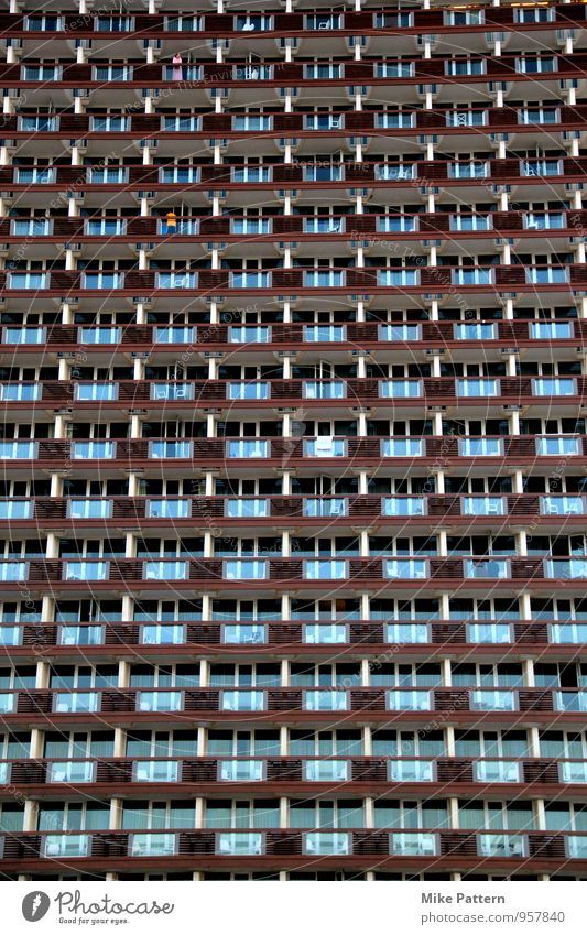 Wall of Balcony House (Residential Structure) High-rise Manmade structures Building Sit Stand Aggression Large Blue Brown Colour photo Exterior shot Evening