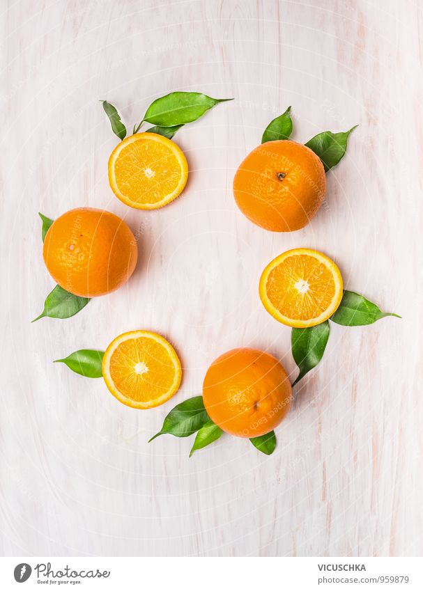 Orange fruit wreath with leaves on white wooden table Food Fruit Nutrition Breakfast Buffet Brunch Banquet Organic produce Diet Juice Design Healthy Eating Life