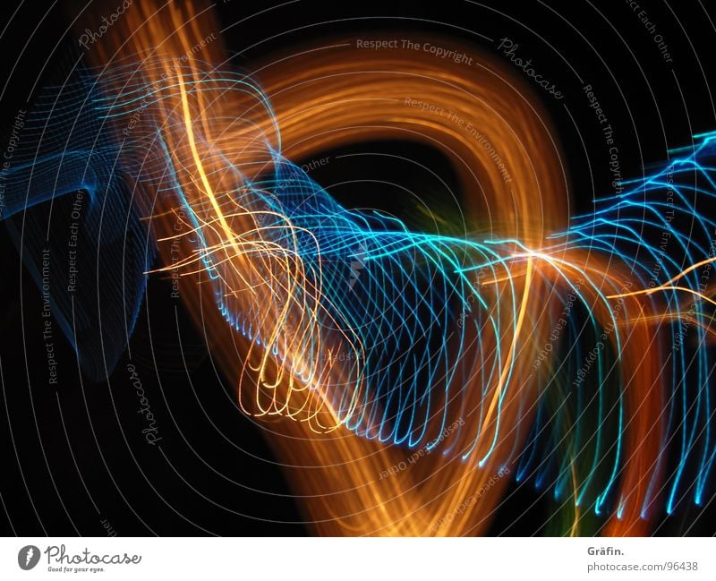 light dance Light Dark Night Black Multicoloured Red Orange-red Green Fresh Long exposure Exposure Spiral Waves Stripe Refraction Prongs Bright Reflection