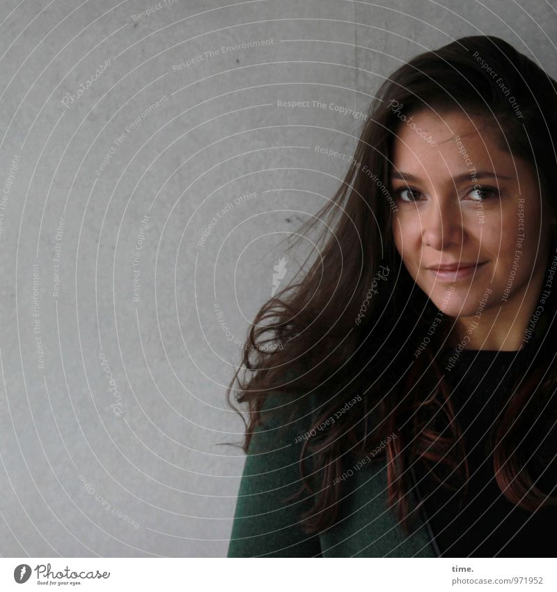 . Feminine Young woman Youth (Young adults) 1 Human being Wall (barrier) Wall (building) Jacket Brunette Long-haired Observe Smiling Looking Wait Beautiful