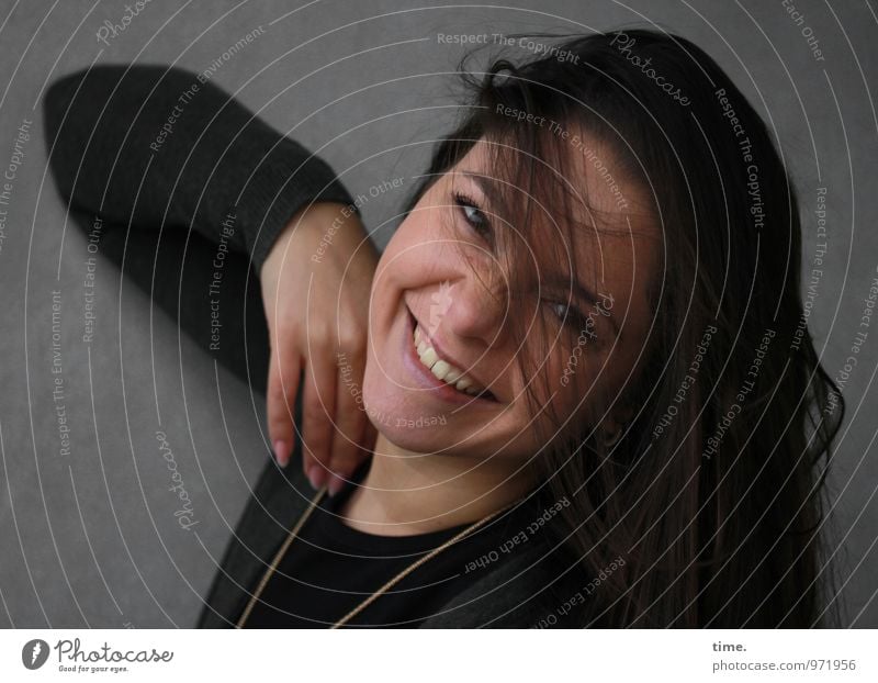 . Feminine Young woman Youth (Young adults) 1 Human being Wall (barrier) Wall (building) Jacket Jewellery Brunette Long-haired Movement Smiling Laughter Looking