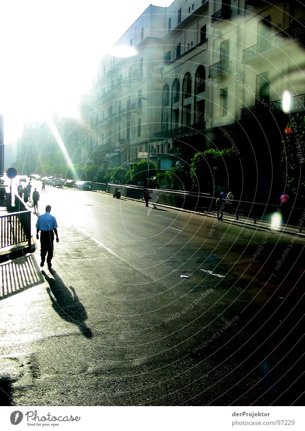 Goes by quickly Egypt Deep Alley Africa Tar Glistening Past Sun bus window Shadow Street book title End