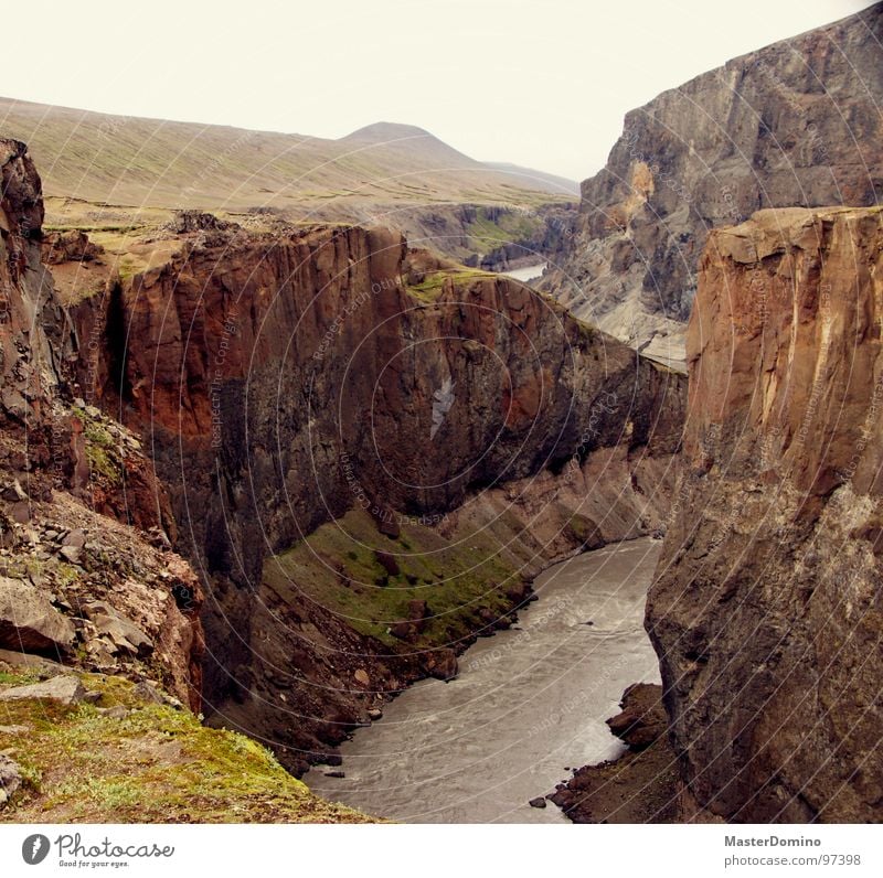 The abysses are opening up Canyon Edge Electricity Rapid Iceland Glacier Stone Sparse Deep Exterior shot River Brook Valley Wild animal Rock Mountain Landscape