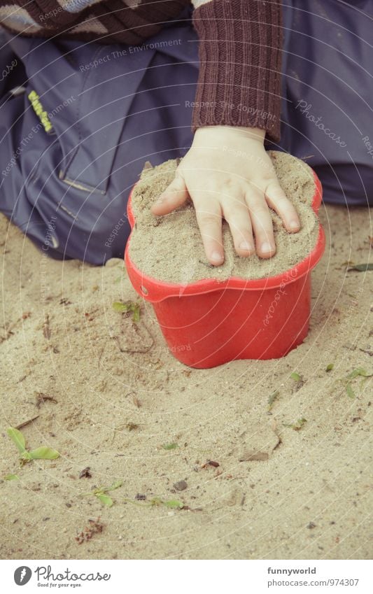 bake bake cake! Child Toddler Hand Fingers 1 - 3 years Sand Sandpit Sand cake moulds Toys Sand toys Plastic Playing Joy Baking tin Colour photo Exterior shot