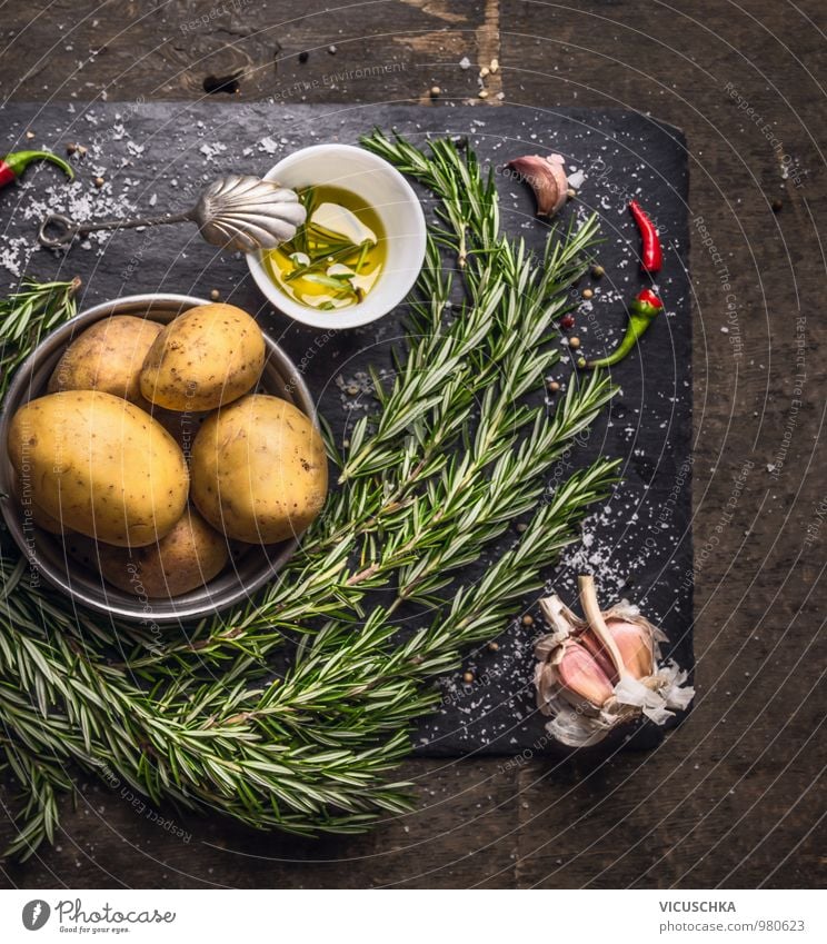 Rosemary potatoes preparation with oil, garlic and spices Food Vegetable Herbs and spices Cooking oil Nutrition Lunch Dinner Organic produce Vegetarian diet