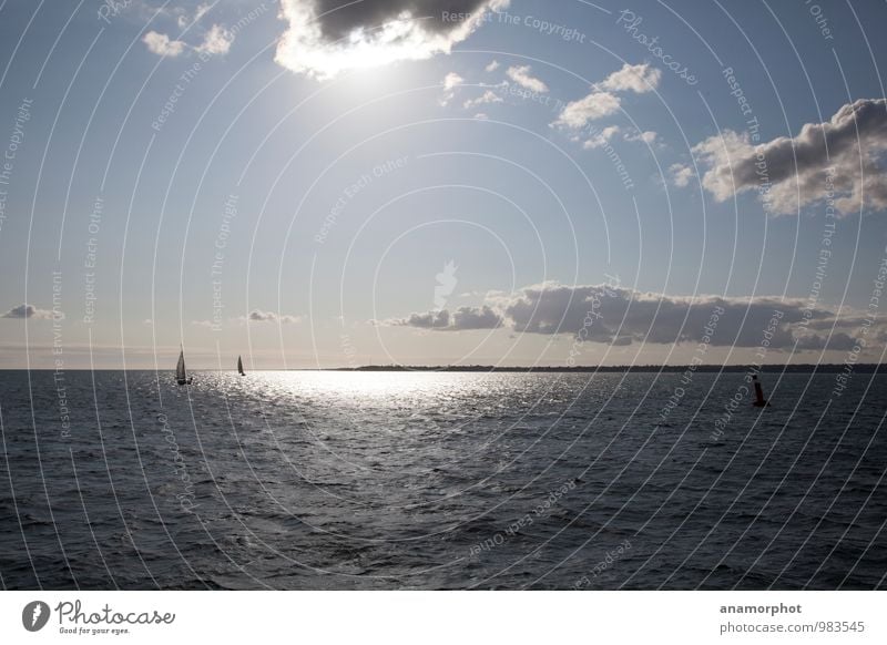 Sailing the Spotlight Vacation & Travel Freedom Sun Ocean Water Sky Clouds Sunlight Summer Beautiful weather Navigation Sailboat Far-off places Maritime Natural