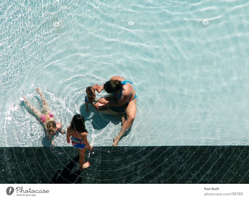 swimming baths Girl Playing Mother Family & Relations Swimming pool Open-air swimming pool Hotel Dive Chlorine Summer Vacation & Travel Joy Water holiday