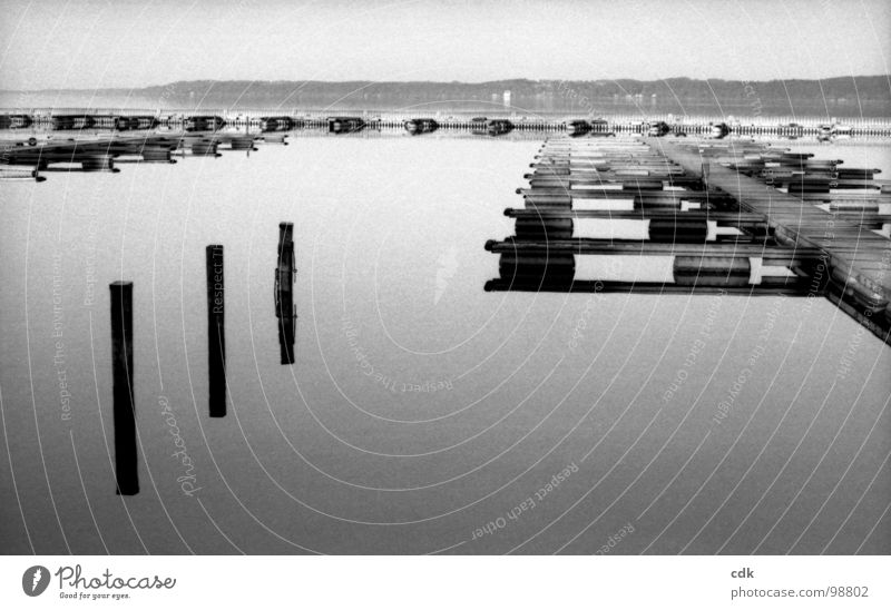 Arrive at the lake | Lake Comforting Smoothness Deserted Jetty Watercraft Come Depart Drop anchor To go for a walk Light Reflection Surface Footbridge Wood