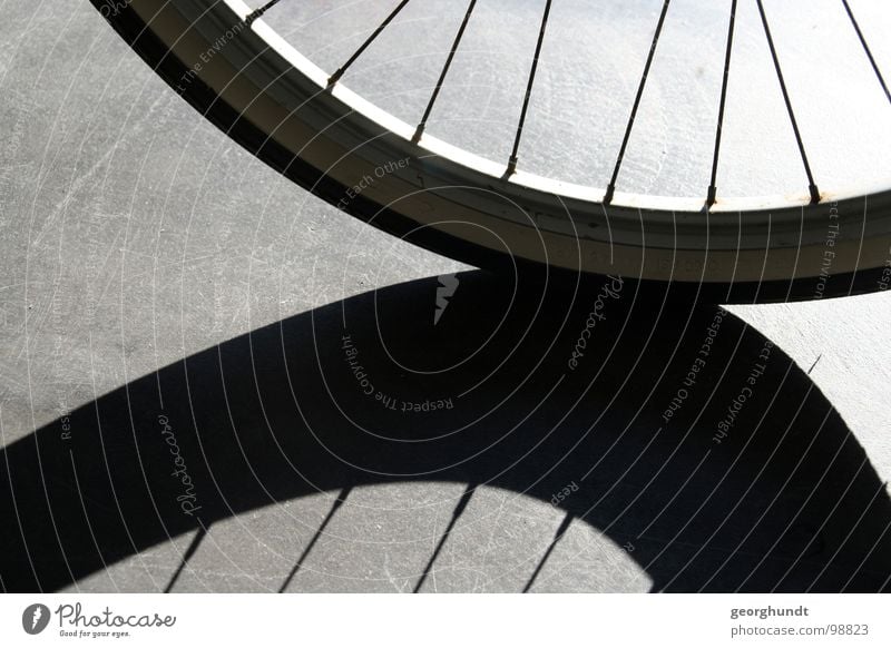 memorios II Bicycle Hallway Black White Wheel rim Reflector Coat Hose Shadow Shadow play Playing Orientation Disorientated Reflection Train station drade Column