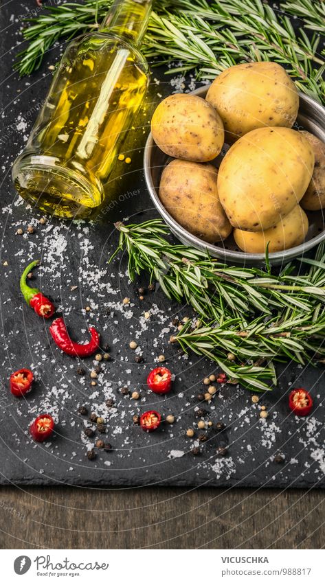 Rosemary prepare potatoes with spices and a bottle of oil Food Vegetable Herbs and spices Cooking oil Nutrition Lunch Dinner Organic produce Vegetarian diet