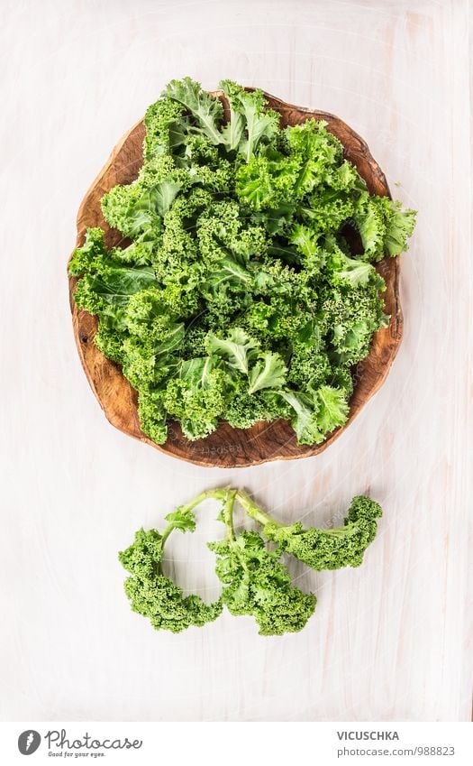 Green cabbage in wooden bowl Food Vegetable Nutrition Banquet Bowl Style Design Winter Garden Kitchen Tradition Kale Kale leaf Cooking Food photograph