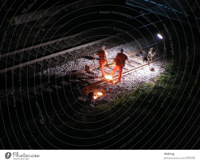 Rail welder I Railroad Railroad tracks Construction worker Night Dark Iron Long exposure Welding Industry