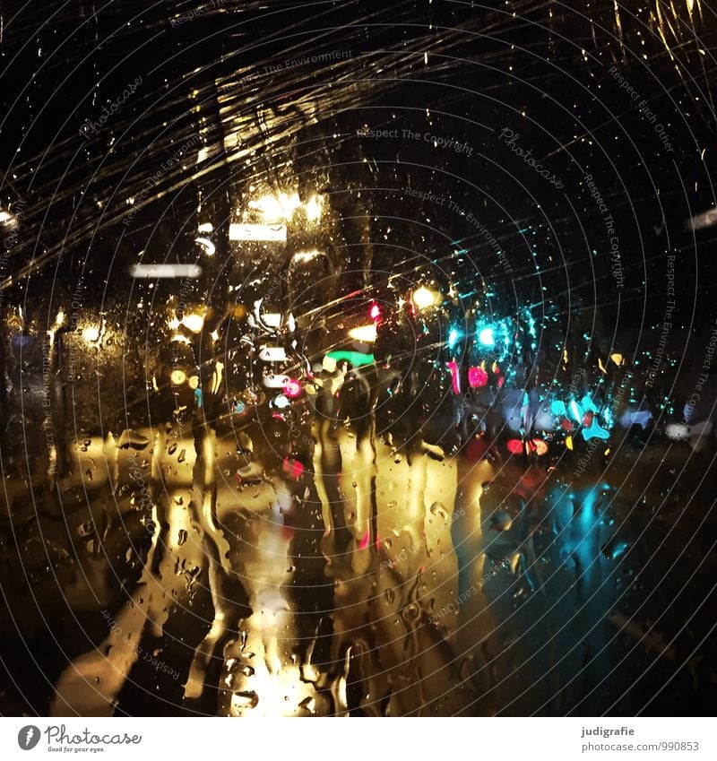 HOME WAY Climate Bad weather Rain Town Transport Motoring Train travel Street Traffic light Dark Wet Multicoloured Moody Chaos Colour photo Exterior shot