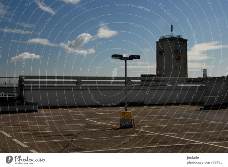 Skypark I Stuttgart Parking garage Parking level Asphalt Parking lot Sixties Lantern Lamp Trash container Concrete Clouds Mall Traffic infrastructure Deck10