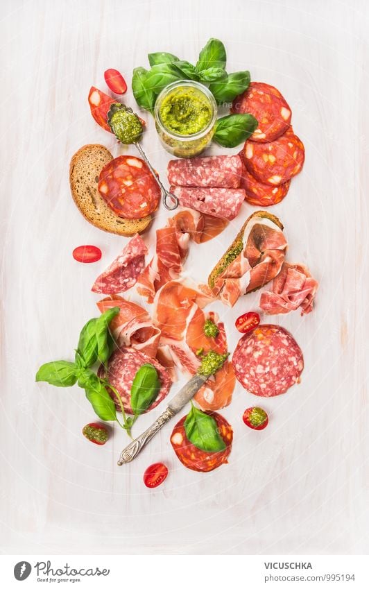 Cold Italian meat platter Food Meat Sausage Herbs and spices Nutrition Lunch Banquet Organic produce Diet Knives Spoon Style Design Italien pesto Composing