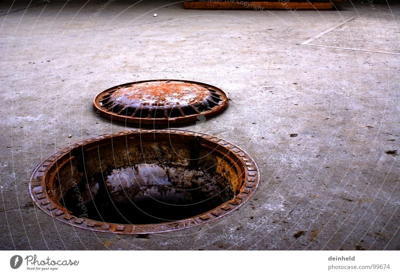 rusty Gully Drainage system Effluent Dirty Slimy Mucus Traffic infrastructure Detail Derelict Rust Floor covering Water Open