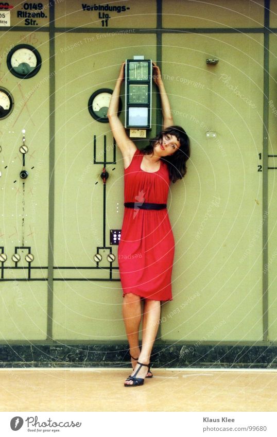 TO PLAY WITH THE BOMB ::::: Woman Sweet Dress Red Fantastic Lamp Table Roof Diffuse Portrait photograph Human being Atomic bomb Kill Bomb Switch Wheel Buttons