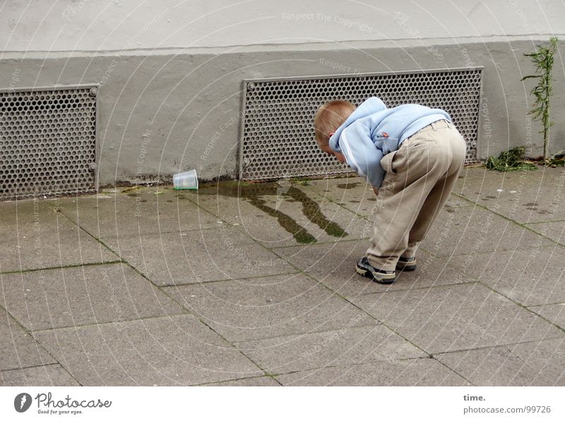 Youth research Looking Mug Education Science & Research Child Street Fluid Wall (building) Stoop Investigate Plastic cup Light blue Spilled out Topple over